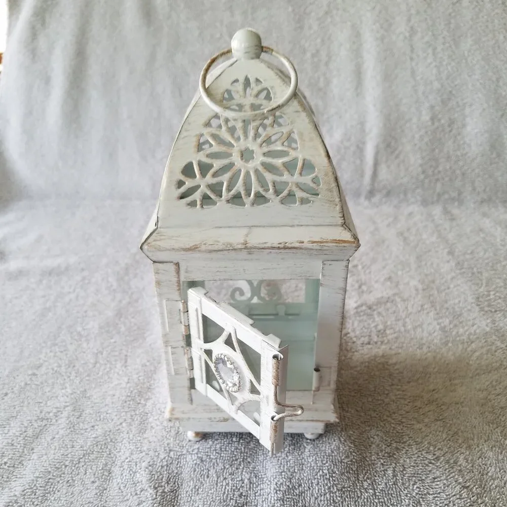 ASHLAND'S ELEGANT ANTIQUE LANTERN IN OFF WHITE WITH DISTRESSED DESIGN IN METAL